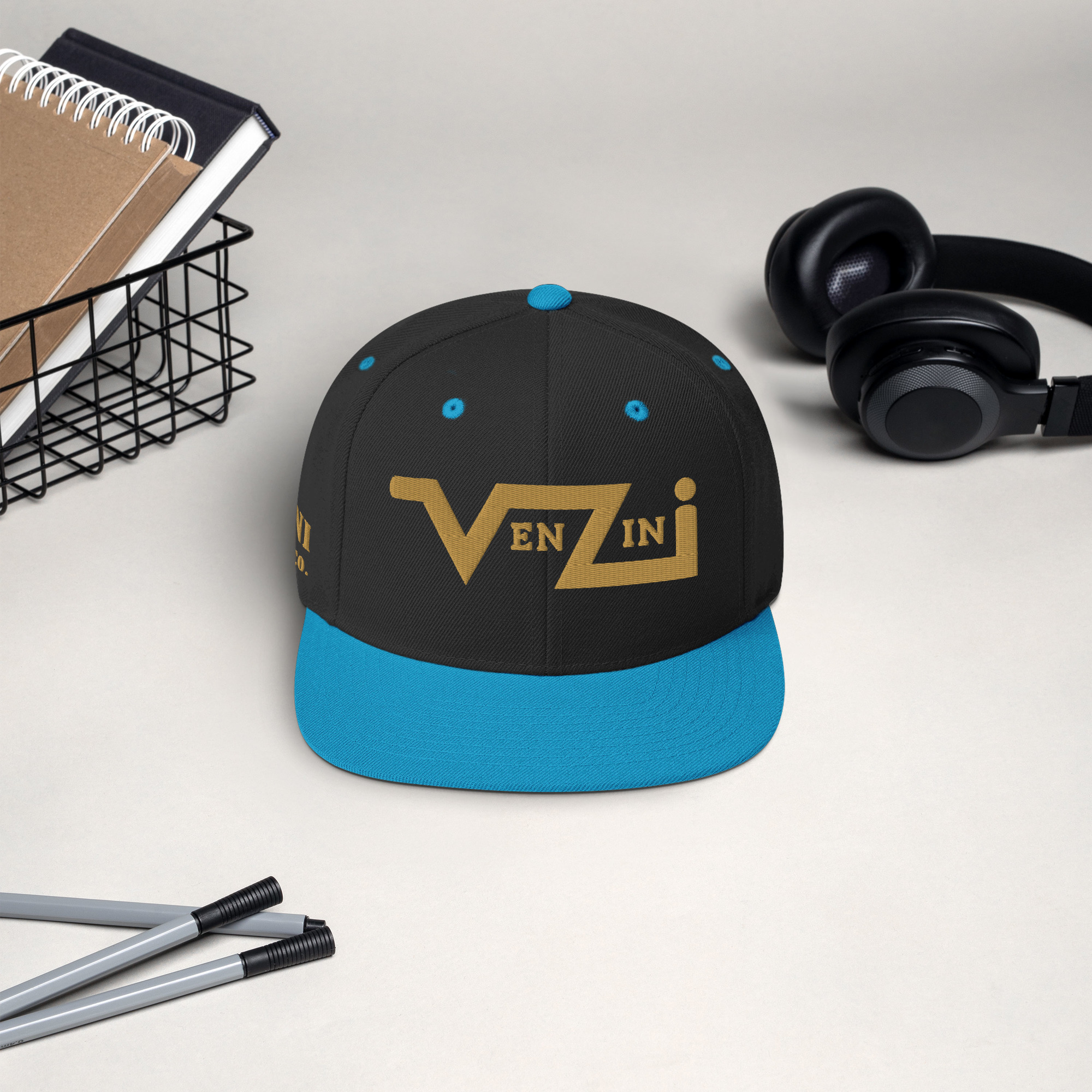 classic-snapback-black-teal-front-685a2960bcbbf.jpg