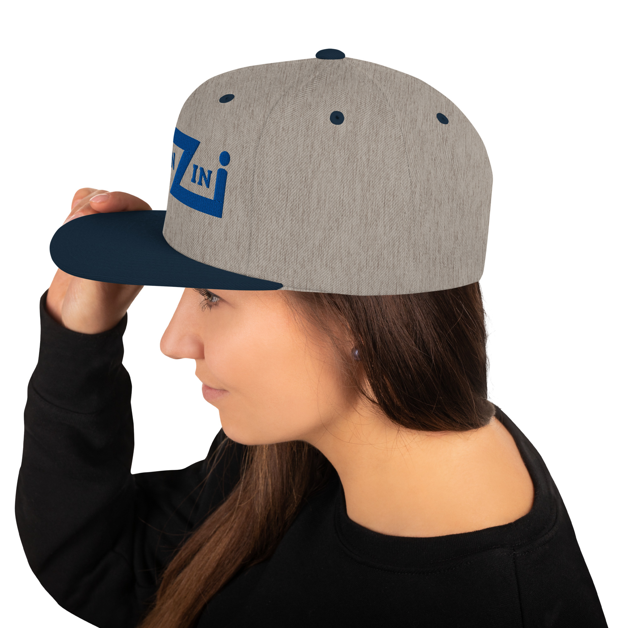 classic-snapback-heather-grey-navy-left-side-685a1a1e160b0.jpg